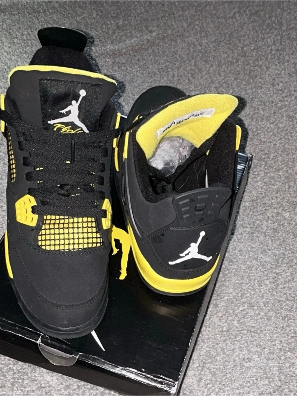 Jordan Retro 4 Black and Yellow Sneakers
